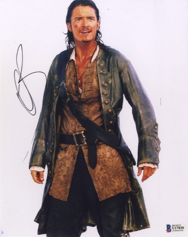 orlando bloom signed photo with becvkett authentication will turner pirates, shanks autographs