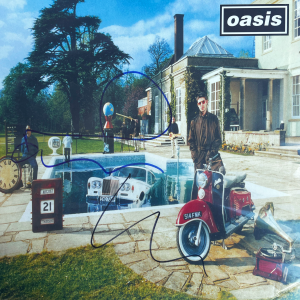 Oasis Be Here Now Vinyl Record signed by Liam & Noel Gallaghher . Shanks Autographs