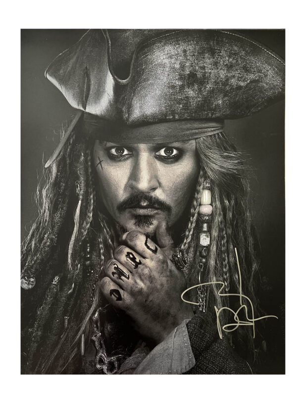 16x20 johnny depp signed pirates of the caribbean jack sparrow. shanks autographs