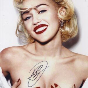 Miley Cyrus signed photo.Shanks Autographs