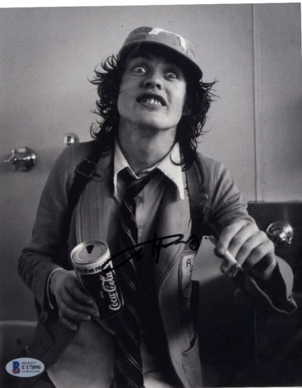 Angus young AC/DC Signed photo.Shanks Autogrtaphs