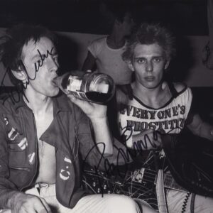 Paul simonon & Topper Headon signed photo, the clash . shanks autographs