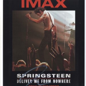 Jeremy Allen while Springsteen signed photo