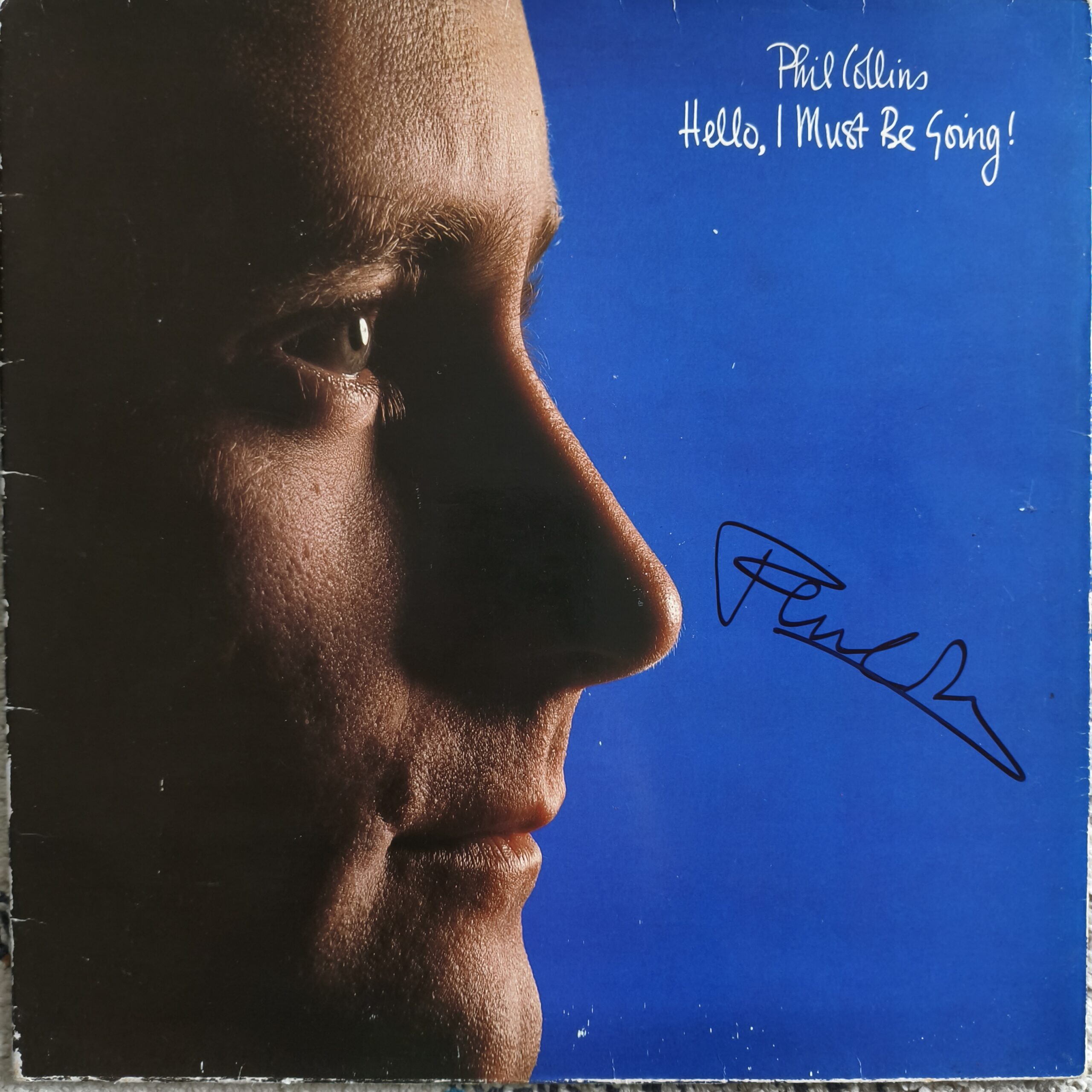 Phil Collins signed Hello, I Must Be Going! 12-inch vinyl LP album cover with black autograph, JSA authenticated, obtained in London in the early 2000s.